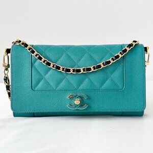 Chanel Turquoise Mademoiselle Flap Wallet with chain.